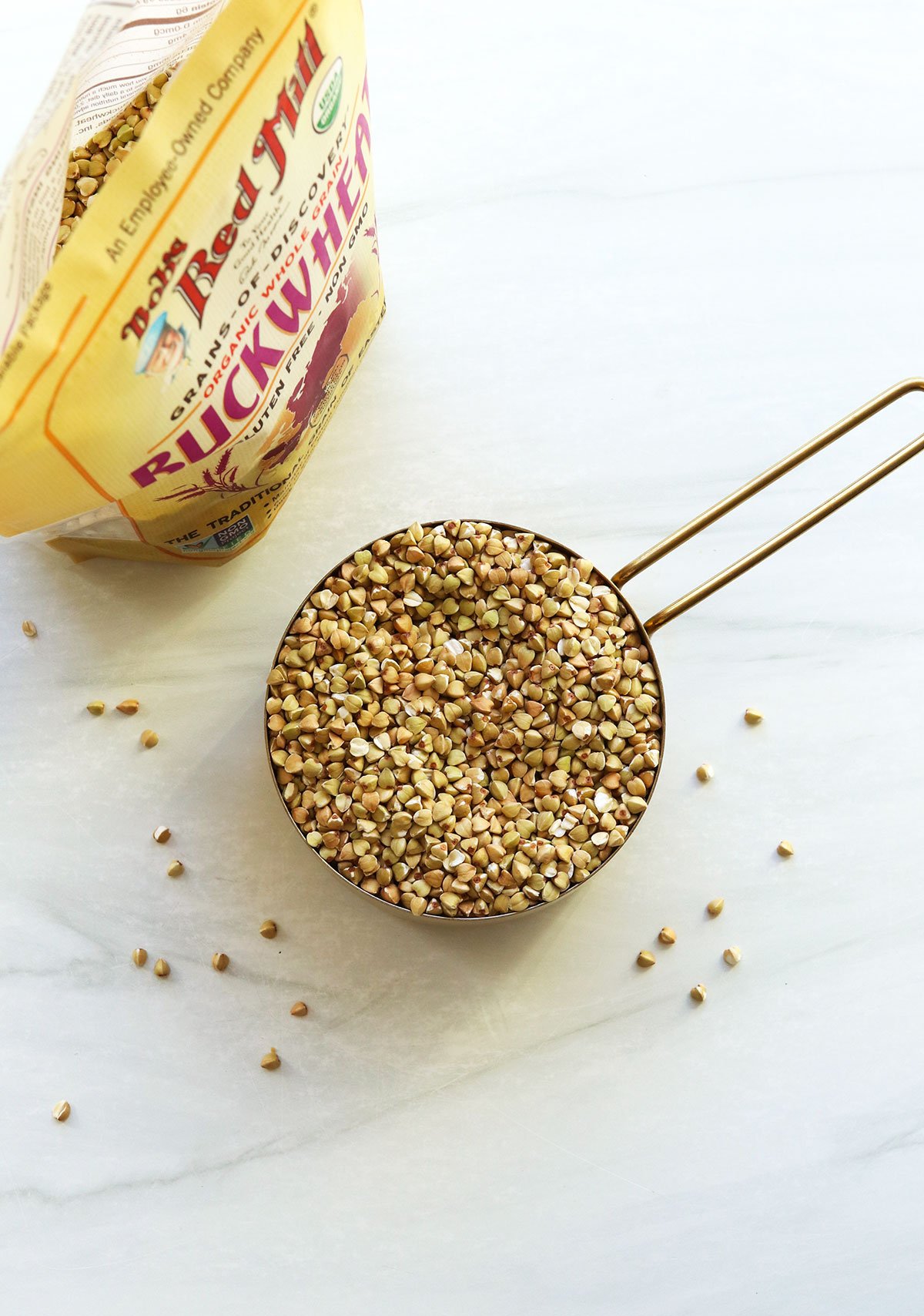 buckwheat groats in a measuring cup.