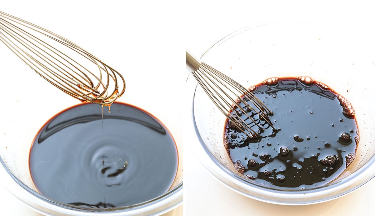 honey added to strained elderberry syrup and whisked in glass bowl.