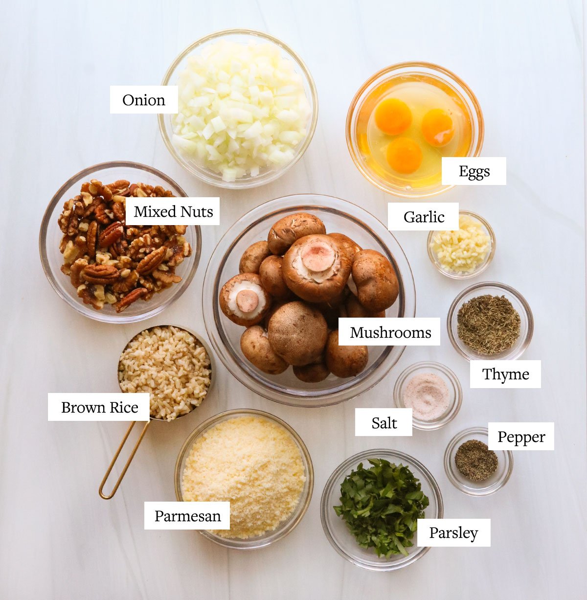 nut roast ingredients labeled on white surface.