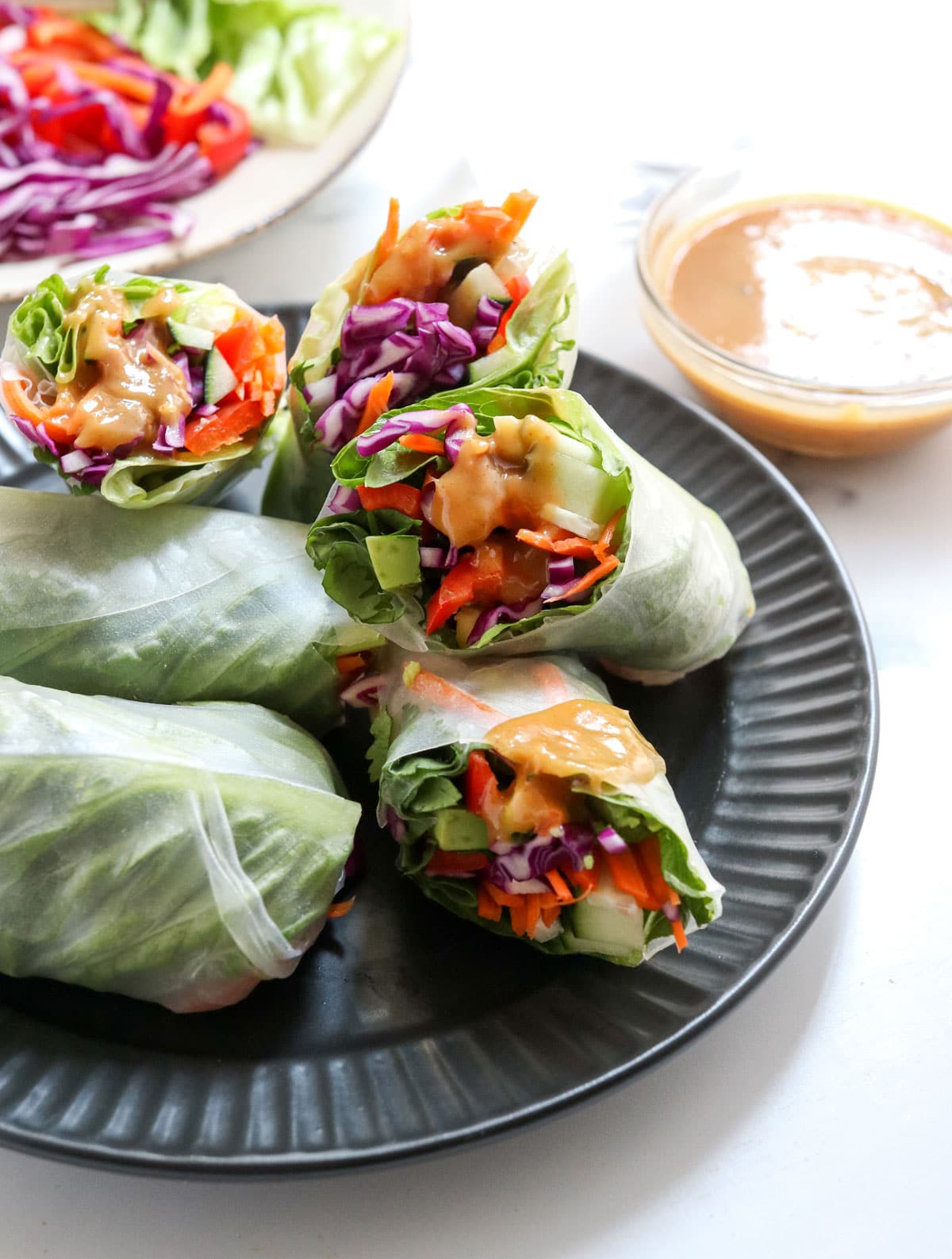 spring rolls with peanut sauce on top