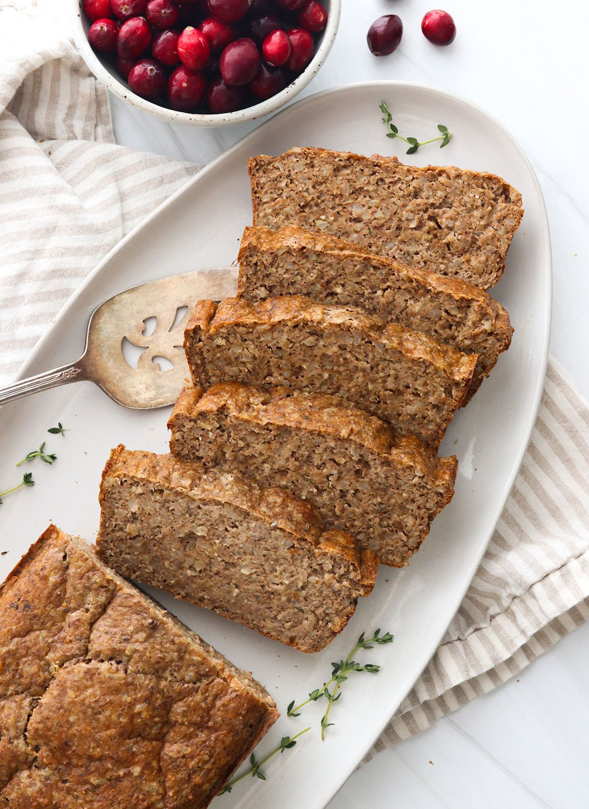 vegetarian meatloaf overhead sliced on a serving platter.